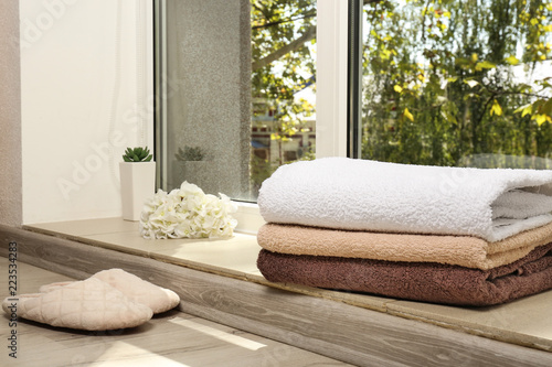 Stacked clean bath towels, ...
