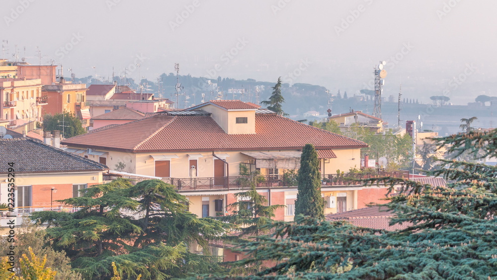 Fototapeta premium Old houses and trees during sunset in beautiful town of Albano Laziale timelapse, Italy