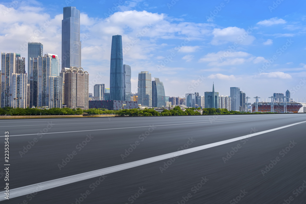 Road pavement and Guangzhou city buildings skyline