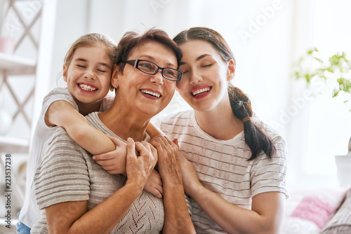 girl, her mother and grandmother