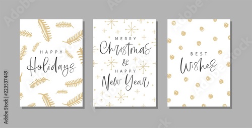 Set of Christmas and Happy New Year greeting cards with handwritten calligraphy and hand drawn decorative elements.