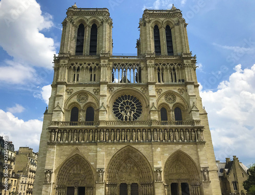 Frontal facade of the Notre-Dame cathedral, UNESCO world patrimony, city of Paris, France