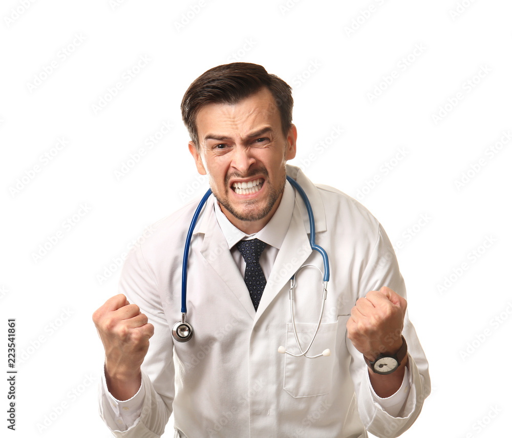 Handsome stressed doctor on white background Handsome stressed doctor on white background