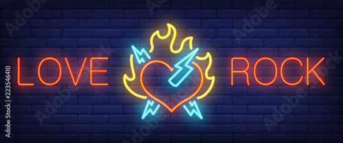 Love, rock neon text with heart on fire and lightning. Rock music and advertisement design. Night bright neon sign, colorful billboard, light banner. Vector illustration in neon style.