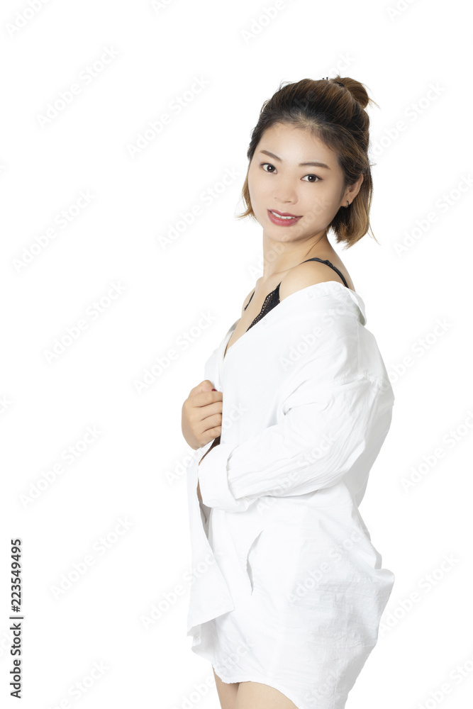 Chinese woman posing in white shirt on white background Chinese woman posing in white shirt on white background