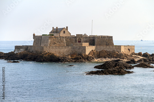 Beautiful view of tidal island Fort National at high tide in Saint-Malo, Brittany, France, a national heritage monument 