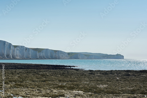 Seaford Head Naturue reserve, East Sussex, England. View of the chalk cliffs, part of Seven Sisters National park in the morning haze, path to the Beachy head, selective focus photo