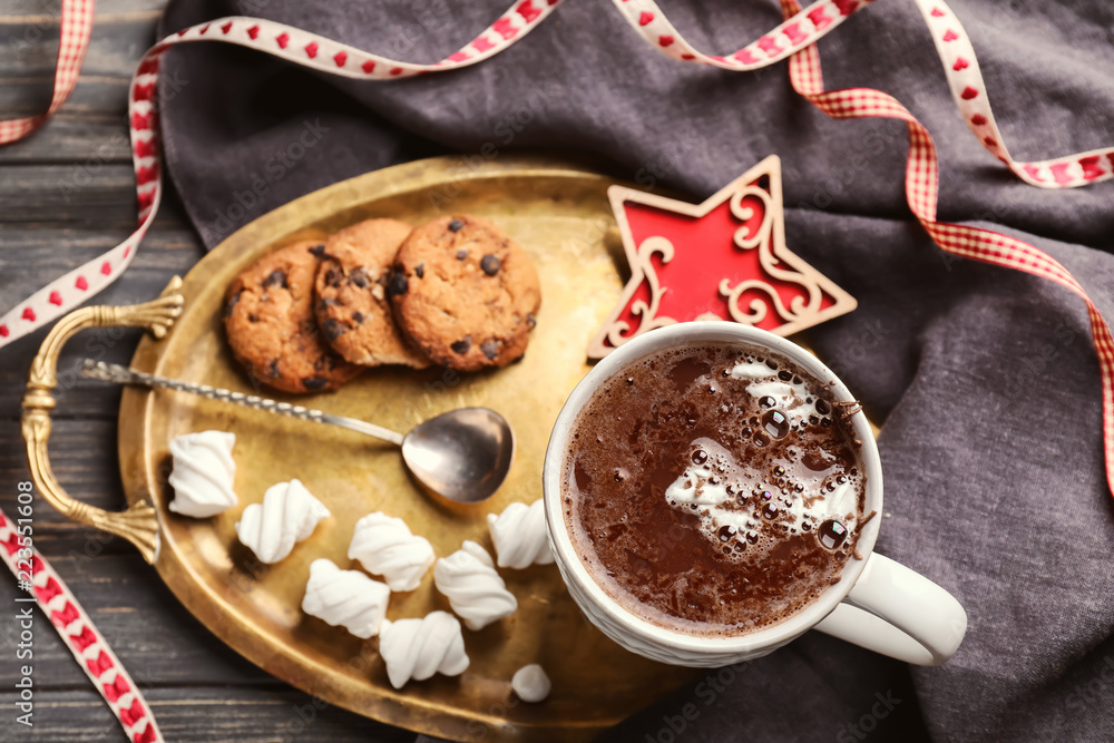 Cup of hot chocolate with marshmallows and cookies on metal tray Cup of hot chocolate with marshmallows and cookies on metal tray