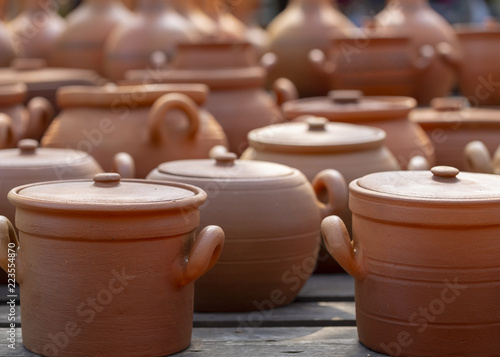 pottery, pots, pitchers in the village market photo