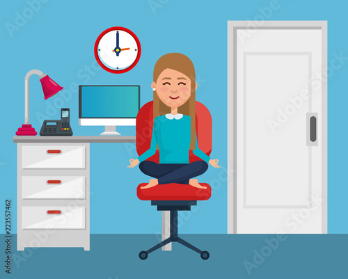 business woman practicing yoga in office chair