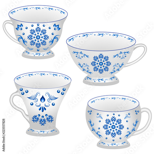Set of tea cups ornate in traditional Russian style Gzhel.