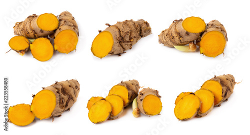 Cutting of turmeric roots isolated on white background