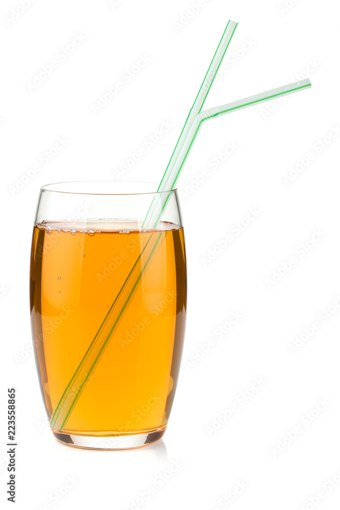 Apple juice in a glass with drinking straws Apple juice in a glass with drinking straws