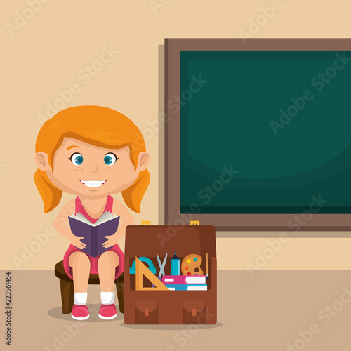 little schoolgirl with chalkboard