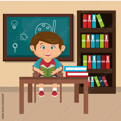little schoolboy in the classroom