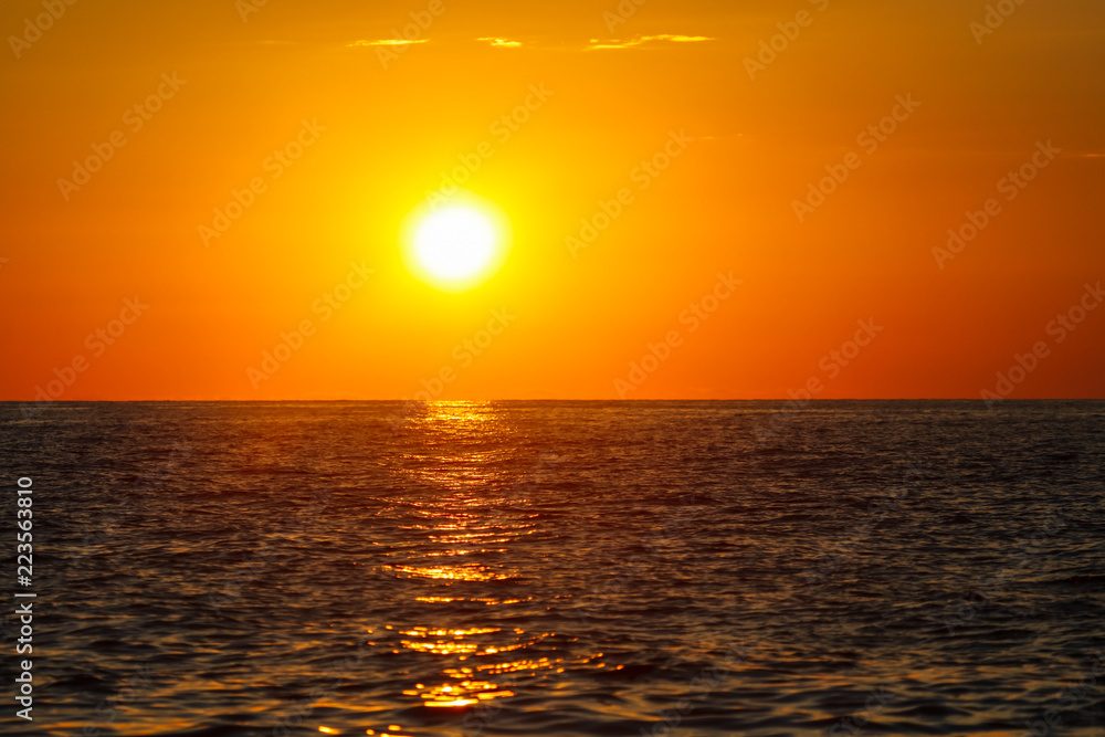 Fototapeta premium Rays of sunset on the black sea