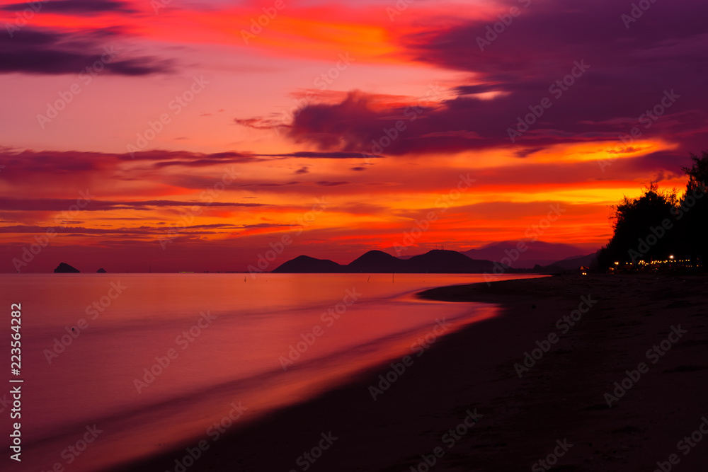 Beautiful beach sea on sunset background.