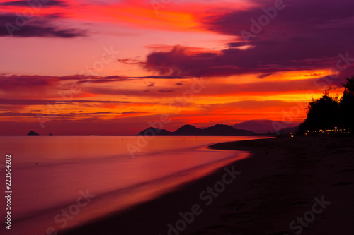 Beautiful beach sea on sunset background.