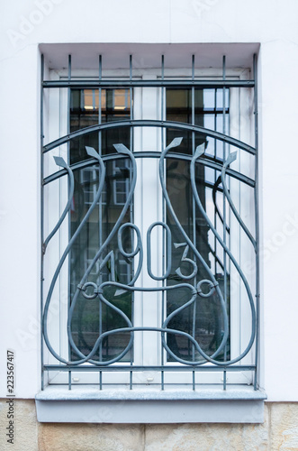 Bild auf Leinwand Window in an Old Art Nouveau Building in Tarnów, Poland