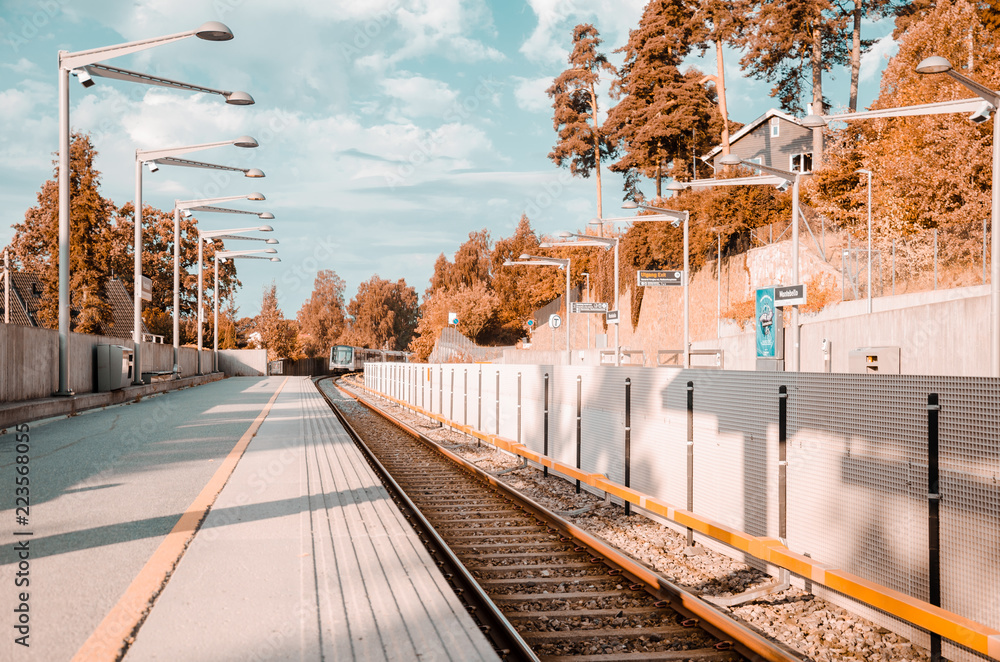 Obraz premium Train approaching open station in Oslo