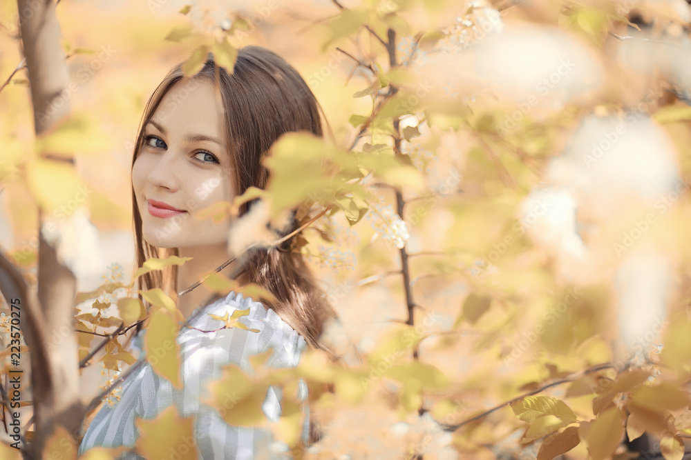 Young girl on a walk in the autumn Young girl on a walk in the autumn
