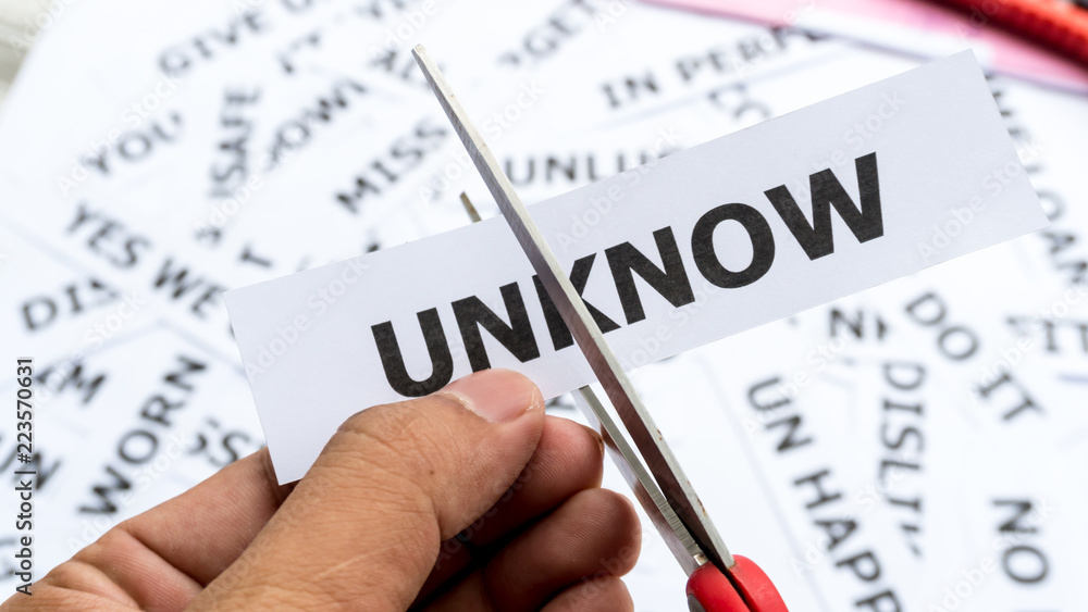 Unknow text or word meaning on paper in hand holding Unknow text or word meaning on paper in hand holding