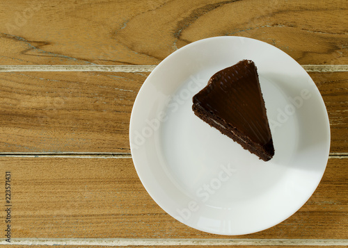 Chocolate cake for sweet and dessert food on wooden table backgrounds above, Top views