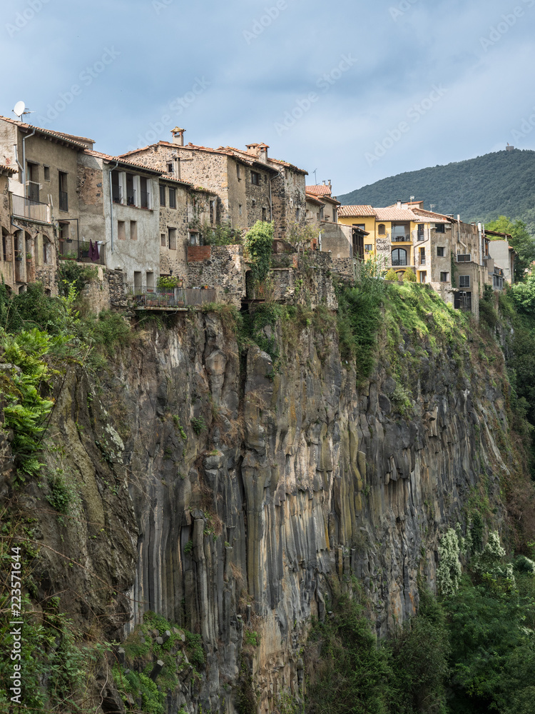 Row of houses on basalt cliff in the Castellfolit de la Roca Village