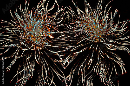 Symmetrical creepy twisted tongs of flame abstract mess-up pattern. photo