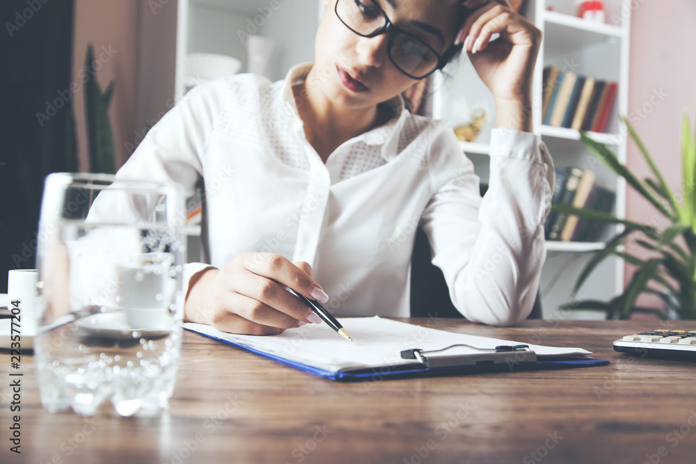 woman hand document on table woman hand document on table