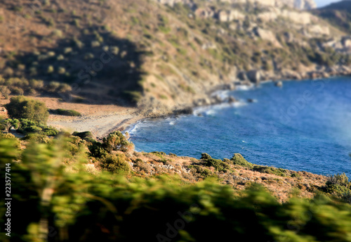 Quiet, deserted beach on the shore of the Mediterranean Sea. Marmaris, Turkey. Tilt shift effect.