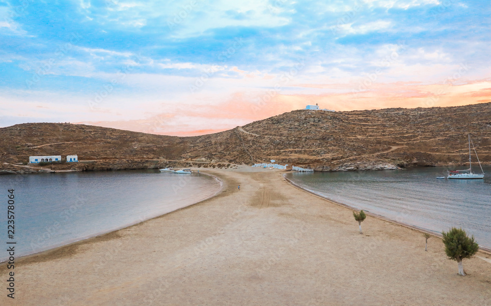Beautiful beach of Kolona double bay Kythnos island, Cyclades, Greece at the end of the day.