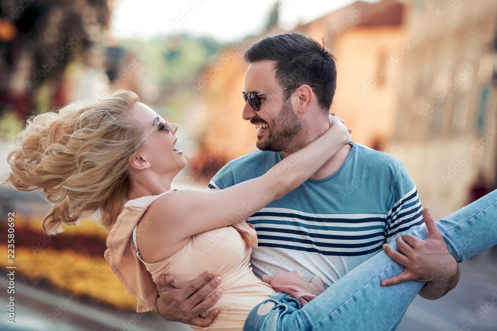 Smiling couple in love outdoors Smiling couple in love outdoors
