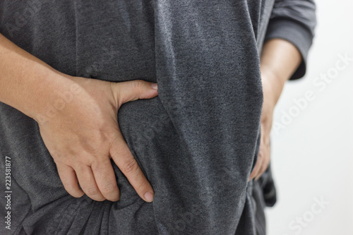 Women touching his fat belly