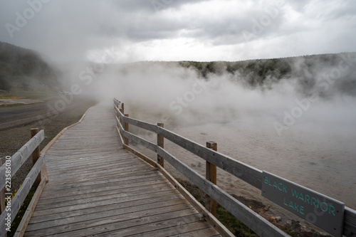Boardwalk through steam from a thermal feature in Yellowstone National Park along Firehole Drive © MelissaMN