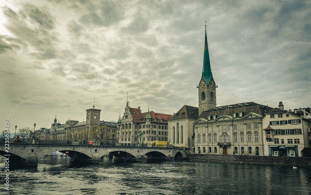 Beautiful view of the historic city center of Zurich with famous Fraumunster Church