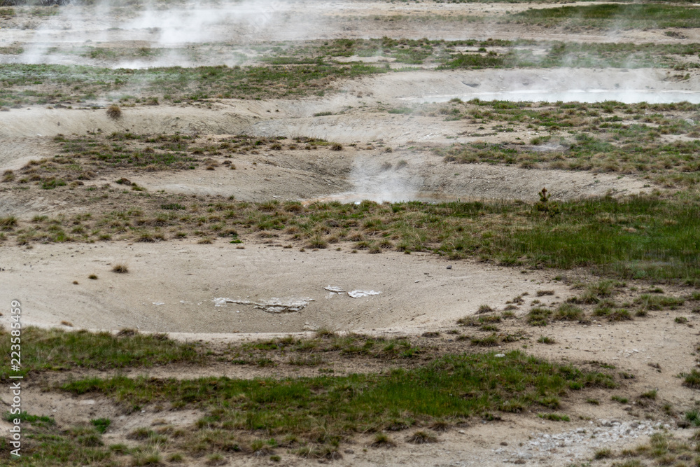 Hot sulfurous gases emerge from a fumarole hot spring in Yellowstone National Park
