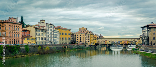 Medieval bridge Ponte Vecchio (Old Bridge) and the Arno River in Florence, Tuscany, Italy.