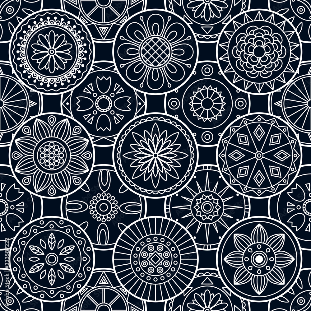 Beautiful seamless pattern with mandalas. Black vector background.
