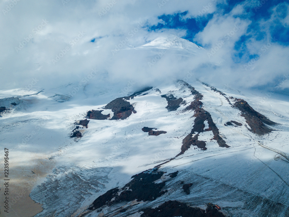 Fototapeta Aerial view from the drone. Glacier among the mountains of the North Caucasus.