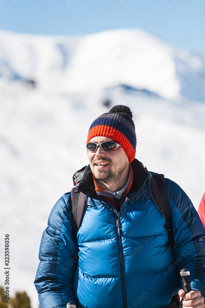 Climber in the mountains in winter. Climber in the mountains in winter.