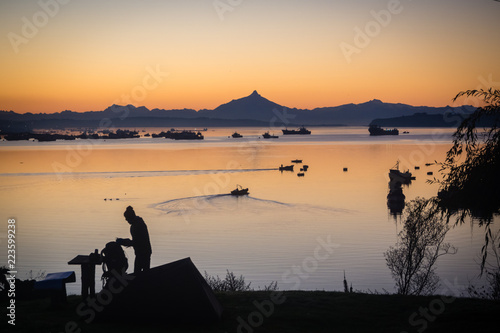 Sunrise in the harbour of Quellon in Chiloe Island. Patagonia in Chile
