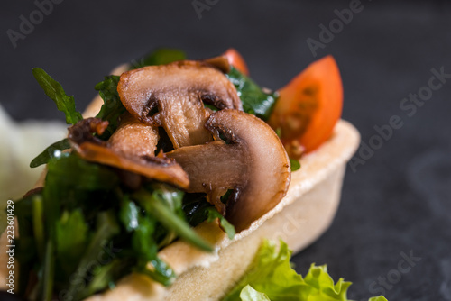 Chisken breast and mushroom salad with sauce, selective focus photo