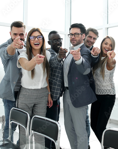 modern business team pointing at you photo