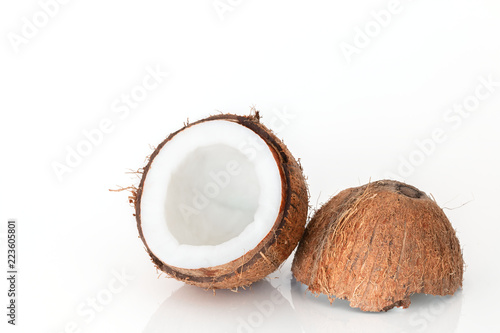 Cut coconut on white background.