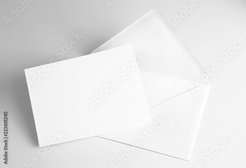 Blank folded white card and envelope 