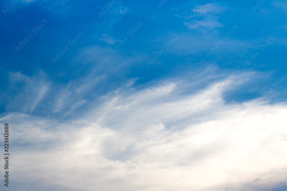 The sun shines on the sky from airplane, View on flight, bird eye view.Over the Clouds. Fantastic background with clouds and mountain peaks.rainbow on the cloud. rainbow in the heaven.