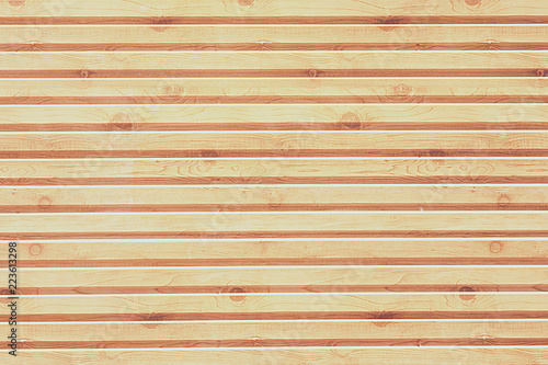 The texture is wooden, the background is made of natural wood. Strip boards.