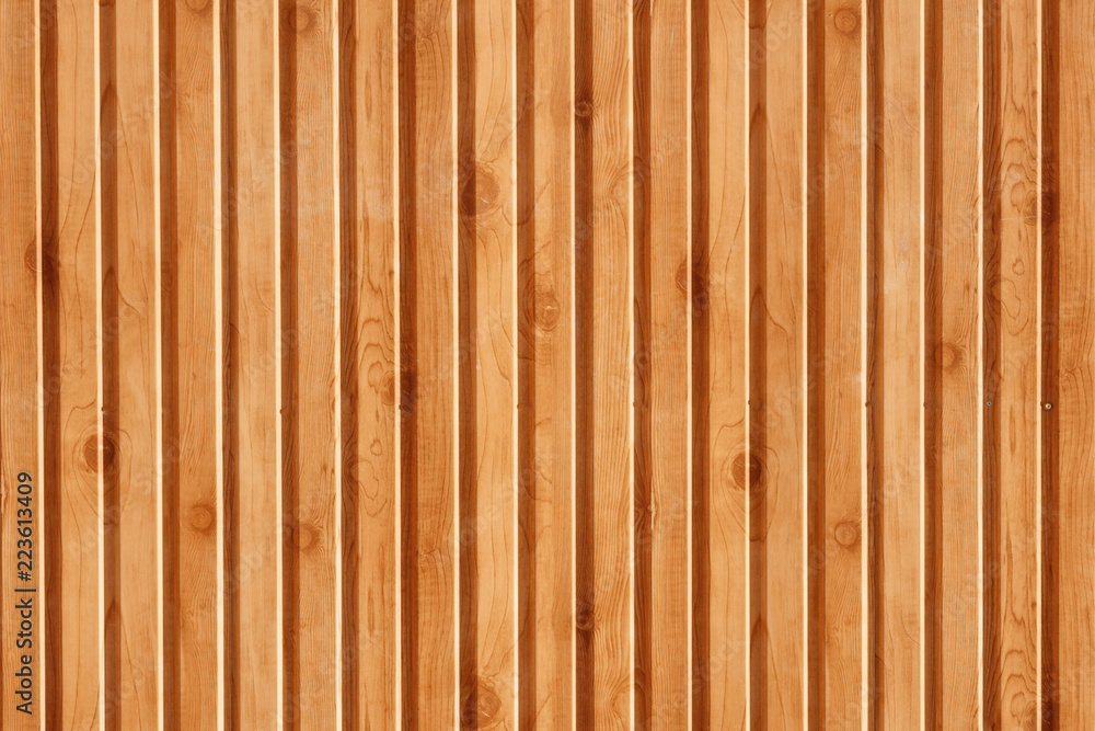The texture is wooden, the background is made of natural wood