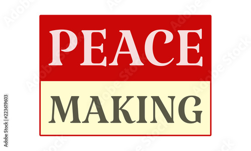 peace making - written on red card on white background